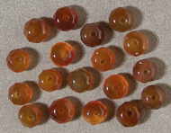 Eighteen faceted rondelle beads from carnelian.
