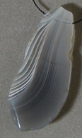 Freeform pendant bead from blue grey Botswana agate.
