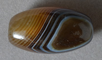 Larger barrel bead from brown agate.