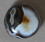 Round pendant bead from brown and white agate.