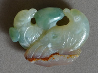 Two birds carved from green chalcedony..