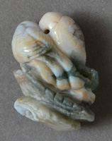 Two birds carved from Madagascar ocean jasper.