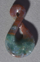 Red and green jade freeform pendant bead.