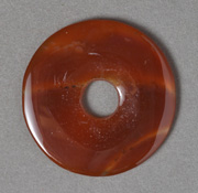 Carnelian tai-ky(donut shaped) pendant bead.