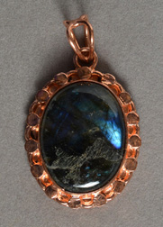 Labradorite pendant with copper bezel.