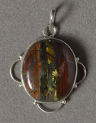 Tiger iron pendant with sterling silver bale.