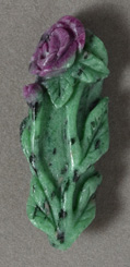 Ruby in fuschite carved pendant bead.