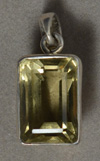Smoky quartz pendant with silver bezel.