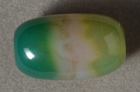 Green and white agate wide barrel bead.
