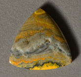 Yellow banded opal triangle pendant bead.