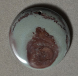 Kona Dolomite round pendant bead.