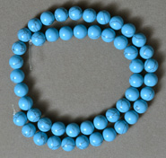 Veined light blue 8mm round beads.