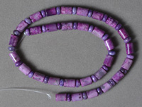 Drum and rondelle beads from purple crazy lace agate.