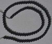 Black jasper 4mm round bead strand.