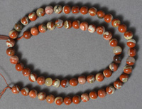 Australian Red River jasper 7mm round beads.
