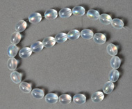 Aurora borialis quartz rounded oval beads.