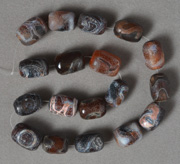 Dzi barrel beads from antique agate.