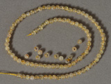 4mm golden rutilated quartz round beads.