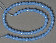 Light blue aquamarine faceted round beads.