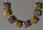 Multi color agate square beads.