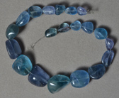 Dark blue fluorite nugget beads.