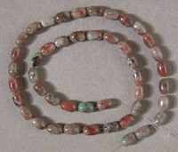 Strand of barrel beads from ruby in fuschite.