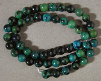 Strand of 8mm chrysocolla round beads.