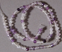 Small faceted round beads from fluorite.