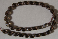 Twist beads from smoky quartz.