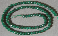 Green jade faceted round beads.