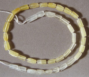 Small rectangle cube beads from yellow aventurine.