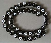 Black and white lampwork bullseye round beads.