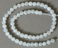 Round beads from rainbow moonstone.