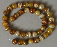 10mm round beads from golden agate.