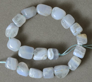 Cube and nugget beads from blue chalcedony.