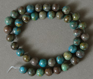 Large round beads from rainbow calsilica.