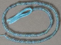 Blue green fluorite rondelle bead strand.