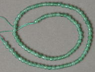 Emerald round beads