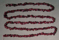 Chip bead red garnet long strand.