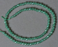 Faceted emerald beads